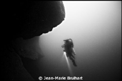 Out of nowhere, this diver came back from a deep dive as ... by Jean-Marie Brulhart 